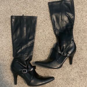 Lightly worn black boots